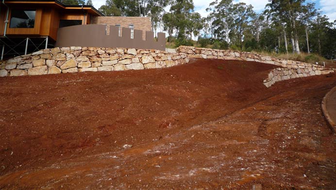 Earthworks and land clearing by classic rock walls